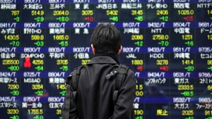 Asian stock markets advance after new Wall St high