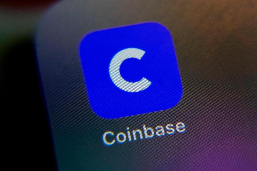 Coinbase soars in market debut, briefly topping $100 billion value