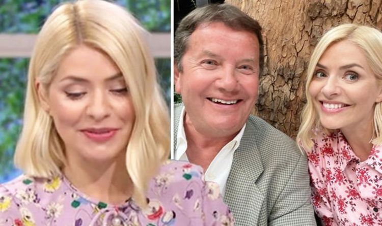 Holly Willoughby stuns fans in ‘lookalike’ snap with dad as she celebrates Father’s Day