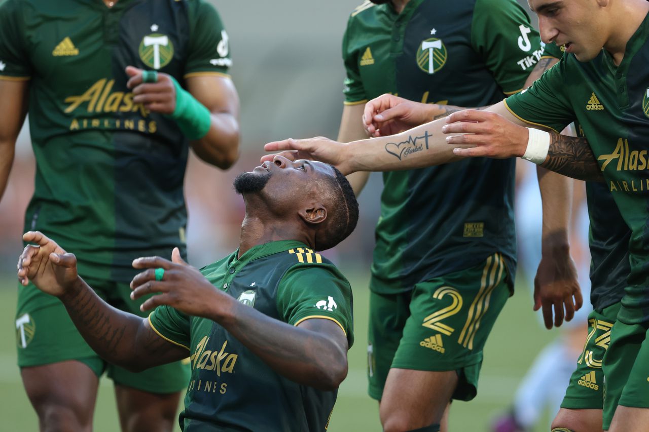 Portland Timbers beat Sporting Kansas City 2-1 after comeback in front of fuller Providence Park