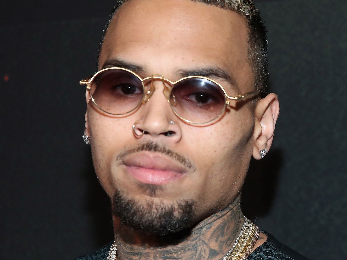 Chris Brown accused of hitting woman at California home, police say