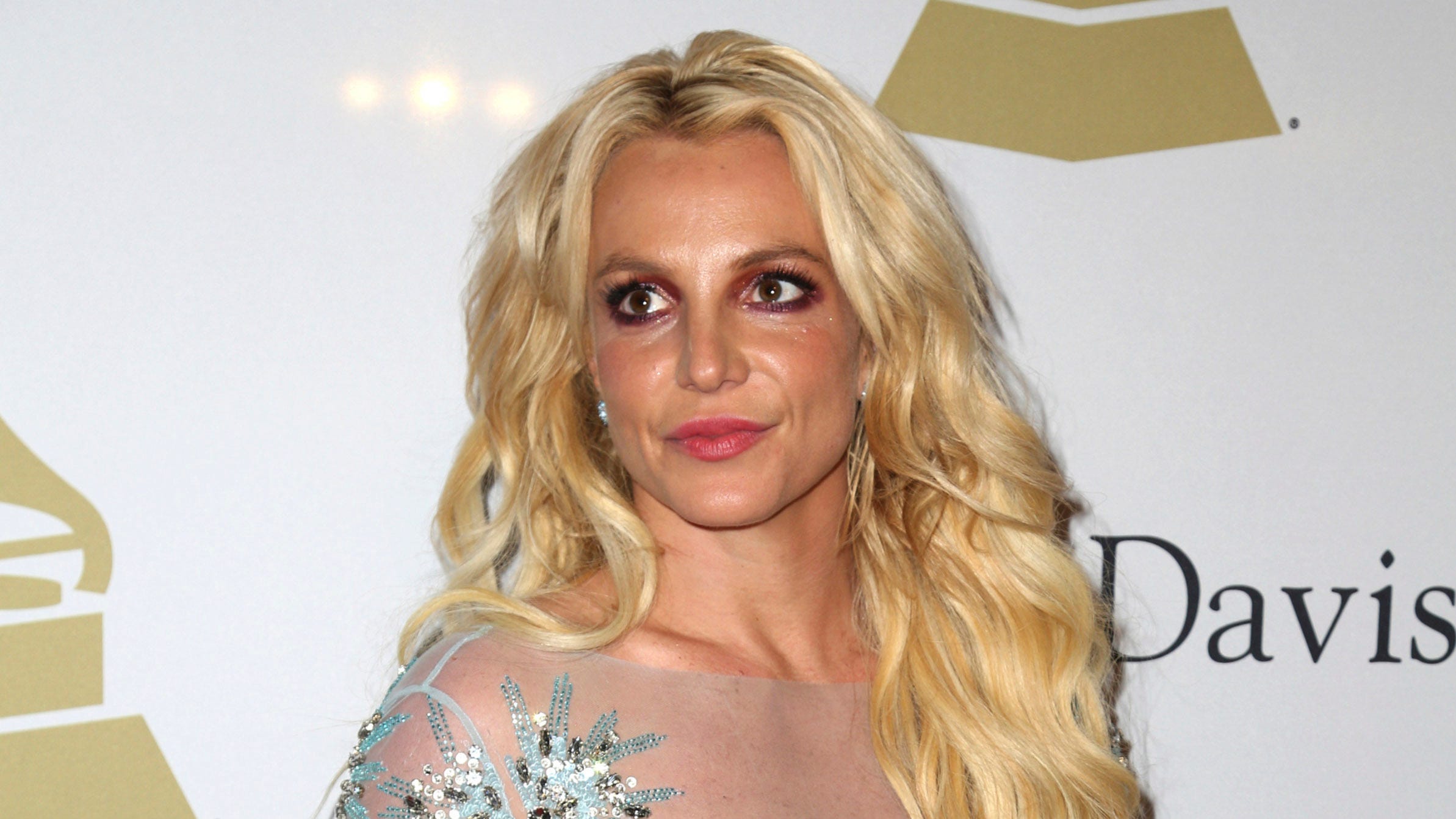Britney Spears apologizes to fans for ‘pretending like I’ve been ok’ after conservatorship hearing