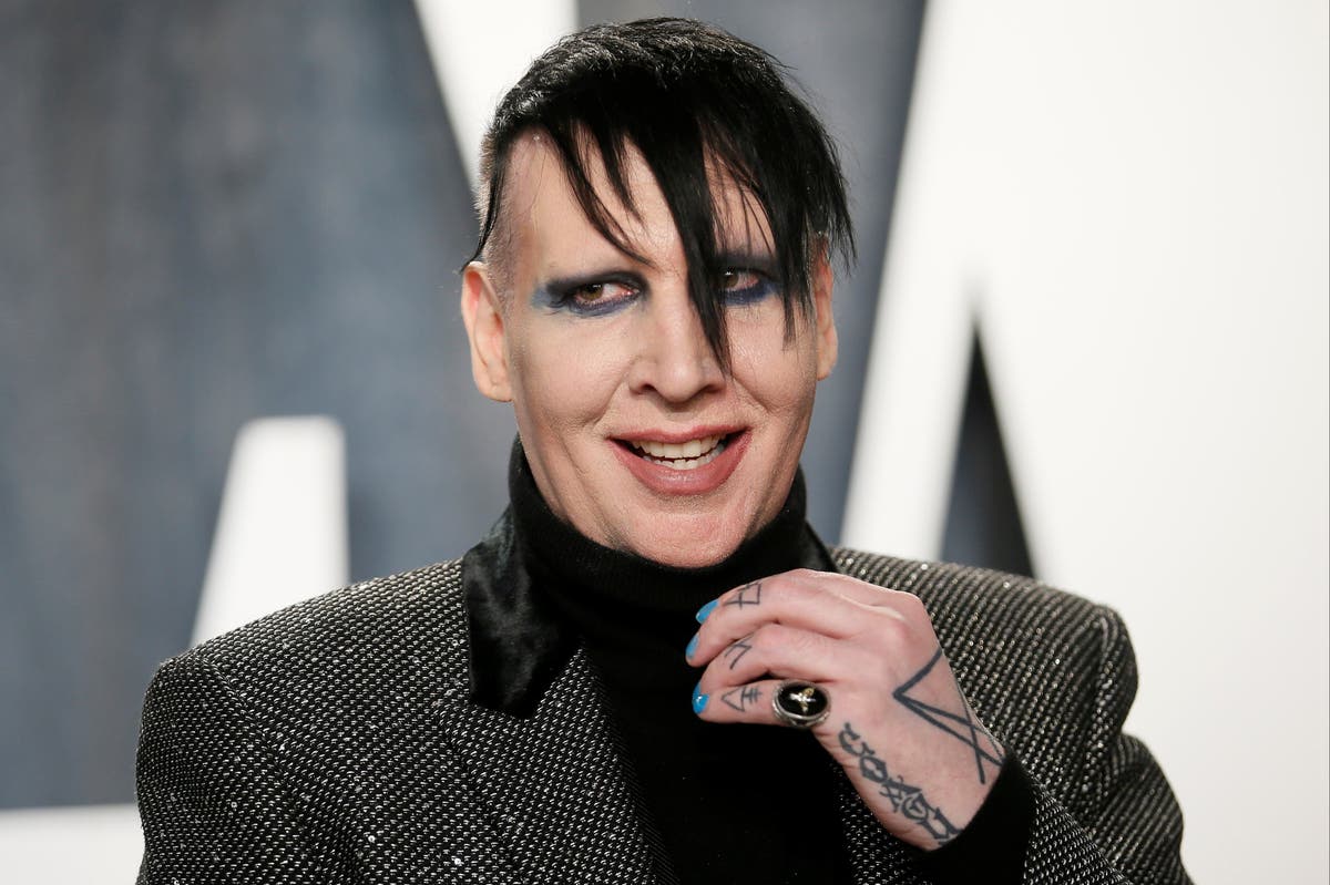 Marilyn Manson to turn himself in to police over alleged assault charges