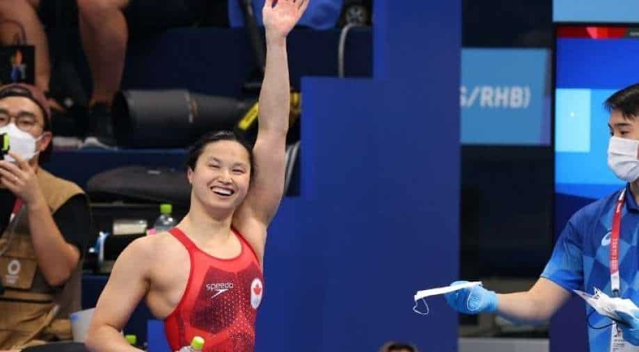 Tokyo Olympics: Canada’s MacNeil wins women’s 100m butterfly gold
