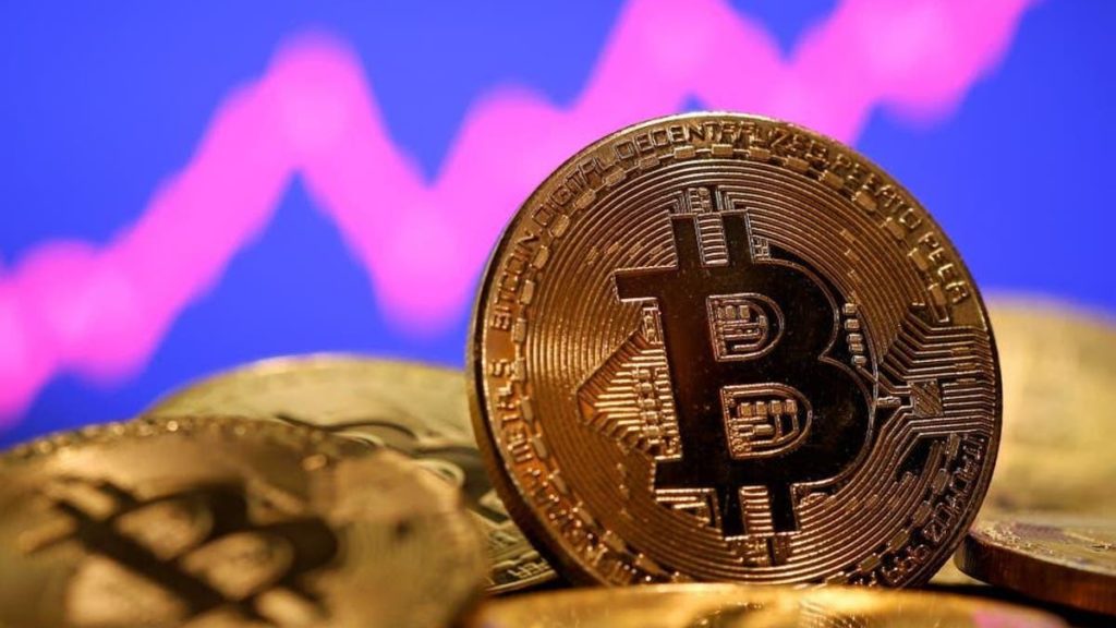 Bitcoin price hits record all-time high amid crypto market frenzy | The Independent