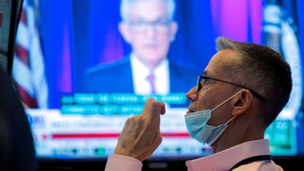 Stock markets rattled by fears about emerging COVID variant | CBC News