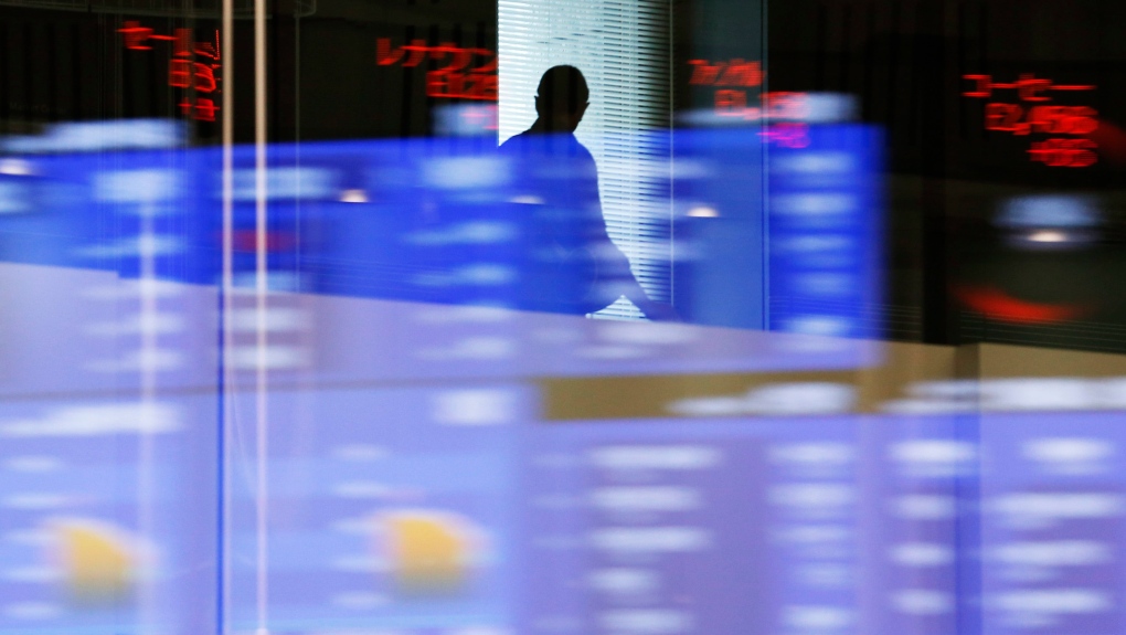 Asia shares slip as investors weigh omicron economic risks | CTV News