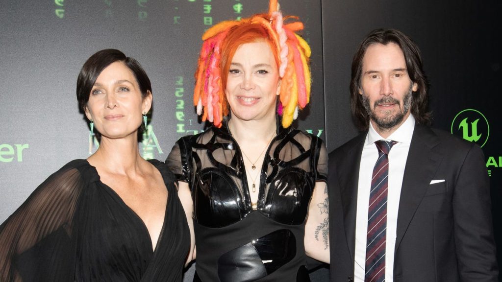 Keanu Reeves, Carrie-Anne Moss hit the green carpet for ‘The Matrix Resurrections’ premiere