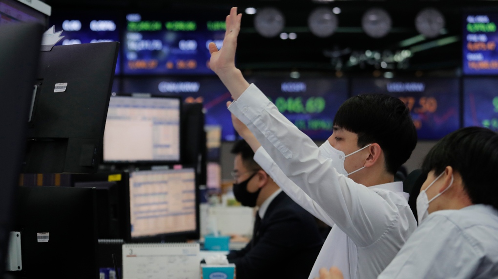 Asian shares extend gains in thin pre-Christmas trading – CTV News