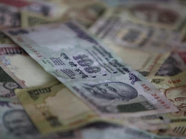 Rupee slips 7 paise to close at 74.51 against dollar on weak market trend – Business Standard