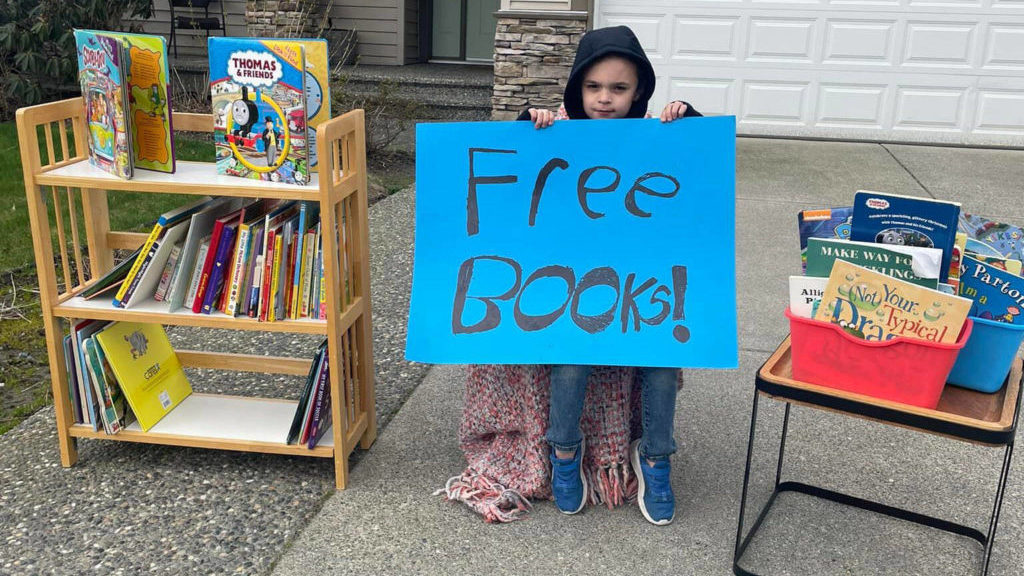 BC boy, 7, spends spring break giving away own books to other kids – Victoria News