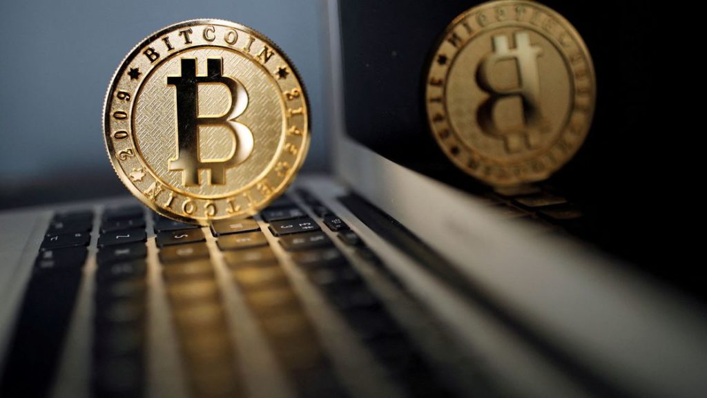 Bitcoin falls to lowest since January, in line with tumbling stock markets | Reuters