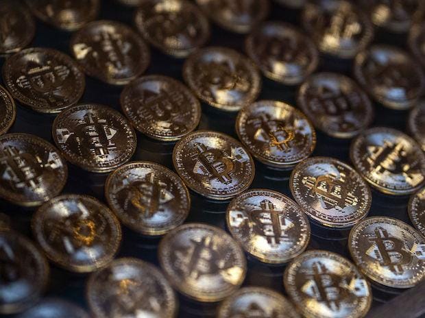 Cryptocurrencies in free fall after biggest Fed rate hike in two decades | Business Standard News